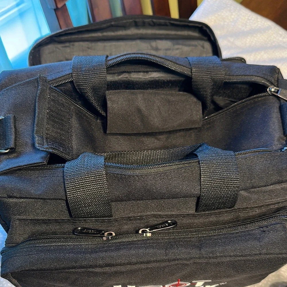 Black Duffel Bag with Rigid Structure and Durable Fabric